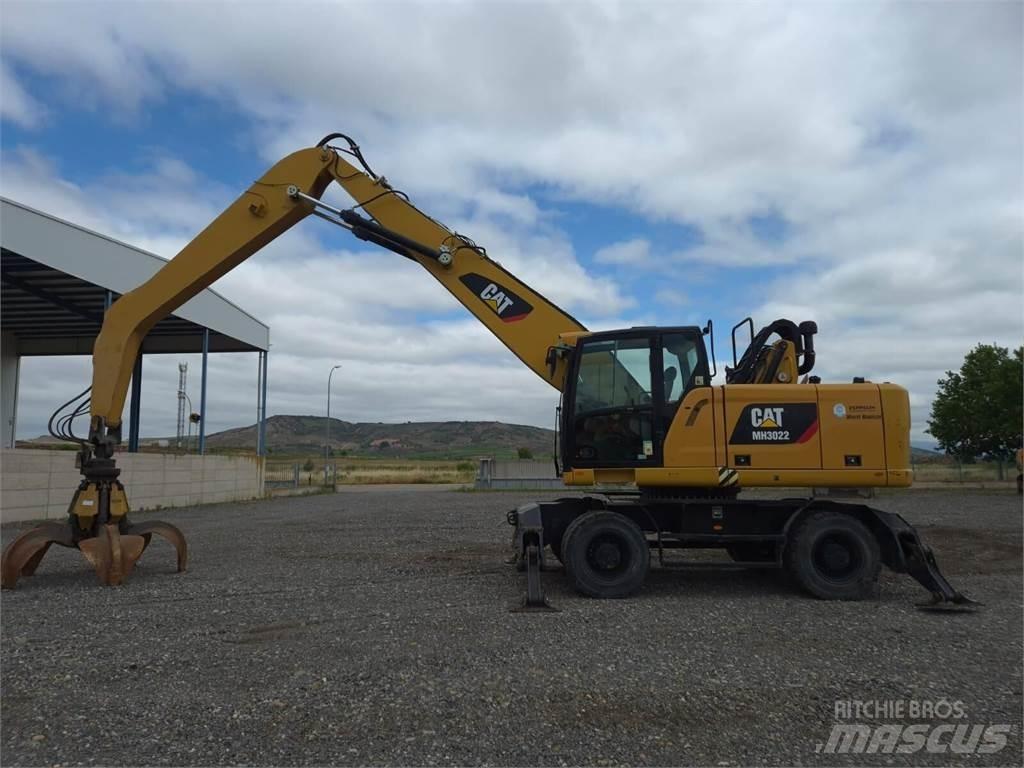 CAT MH3022 Колісні екскаватори