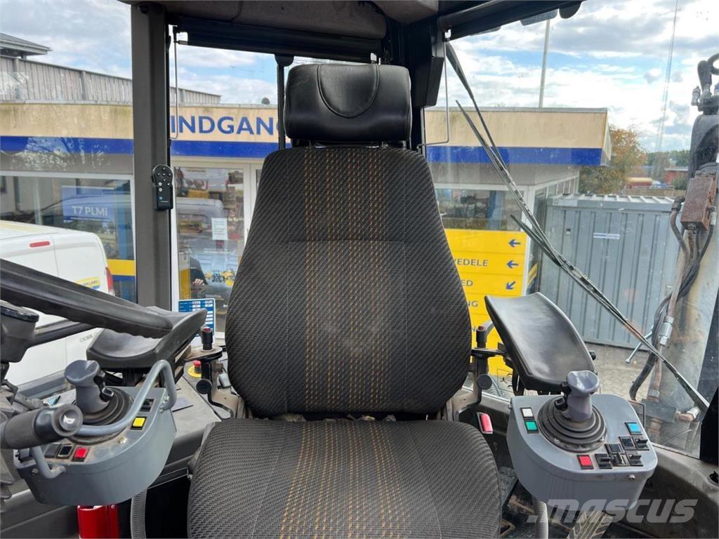 Huddig 1260 Екскаватори-навантажувачі