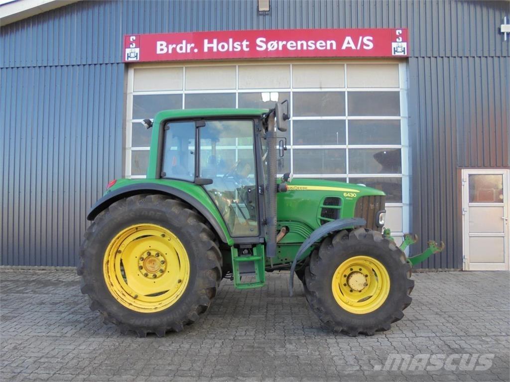 John Deere 6430 Трактори
