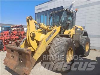 Komatsu W320 Фронтальні навантажувачі