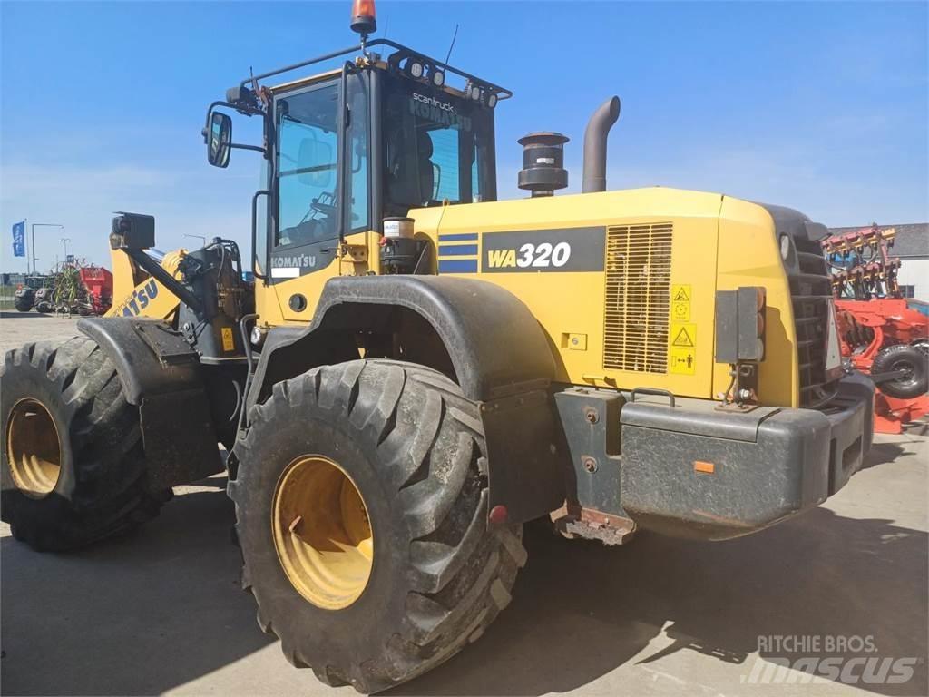 Komatsu W320 Фронтальні навантажувачі