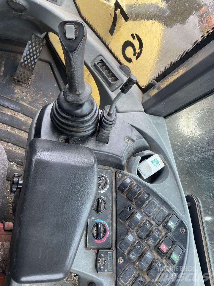 New Holland W190B Фронтальні навантажувачі