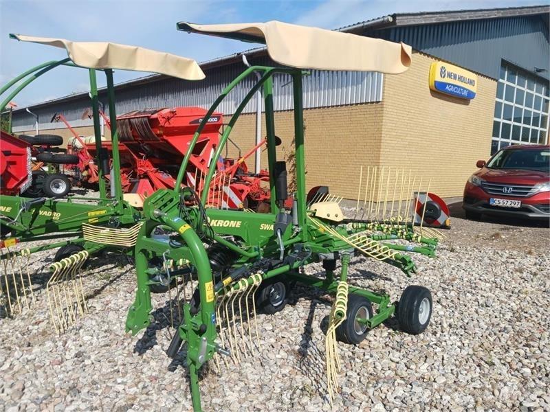 Krone  Граблі і сінозворушувачі