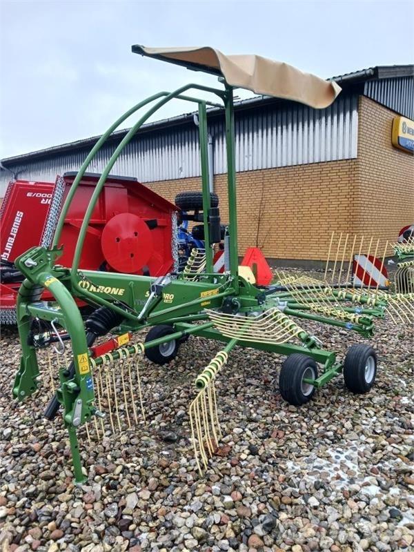 Krone  Граблі і сінозворушувачі