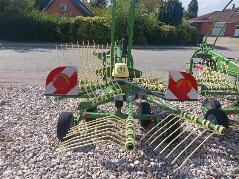 Krone  Граблі і сінозворушувачі