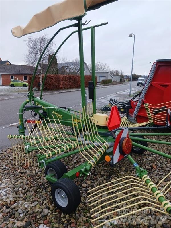 Krone  Граблі і сінозворушувачі