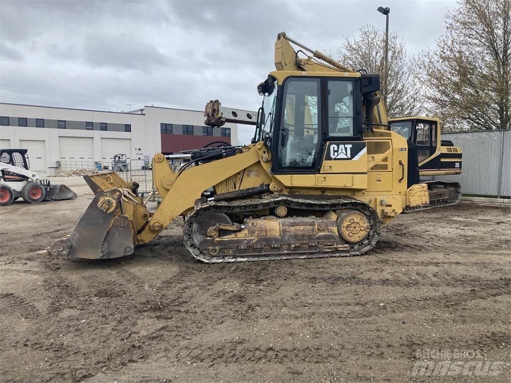 CAT 953D Гусеничні вантажники