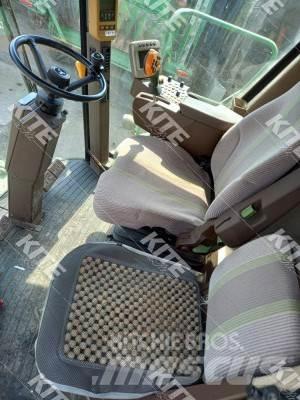 John Deere C670 Зернозбиральні комбайни