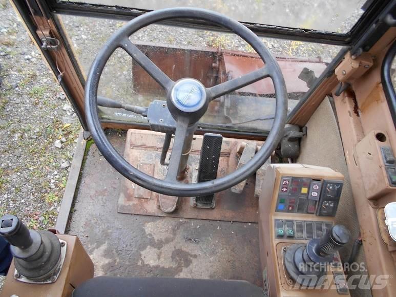 CAT 212B FT Колісні екскаватори