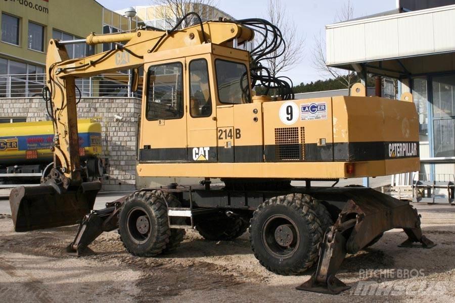CAT 214B Колісні екскаватори