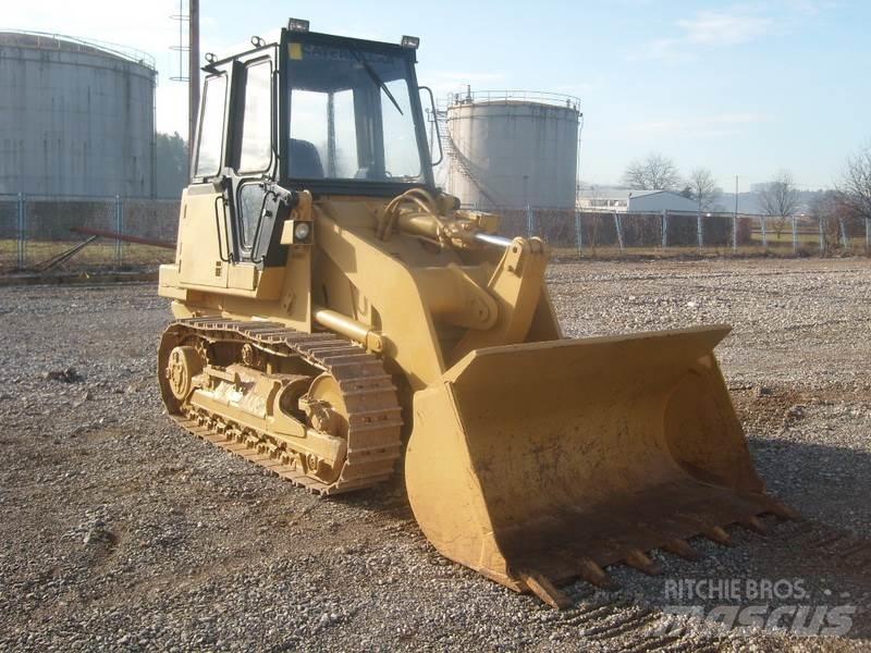 CAT 943 Гусеничні вантажники