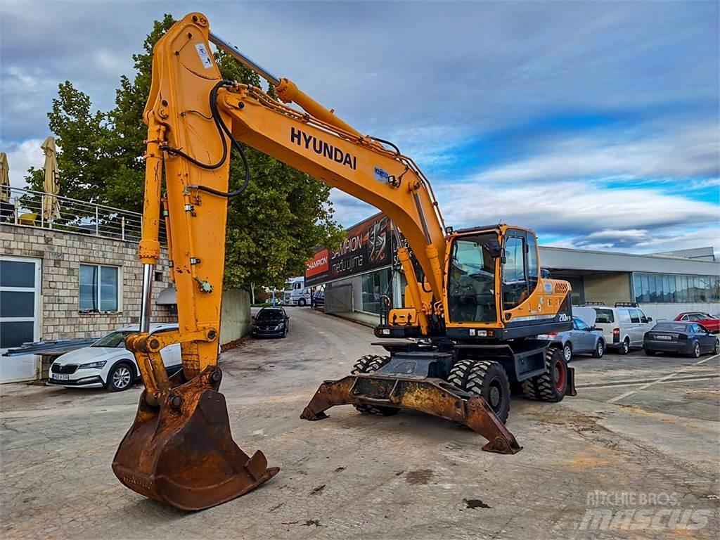 Hyundai R210W-9 Колісні екскаватори