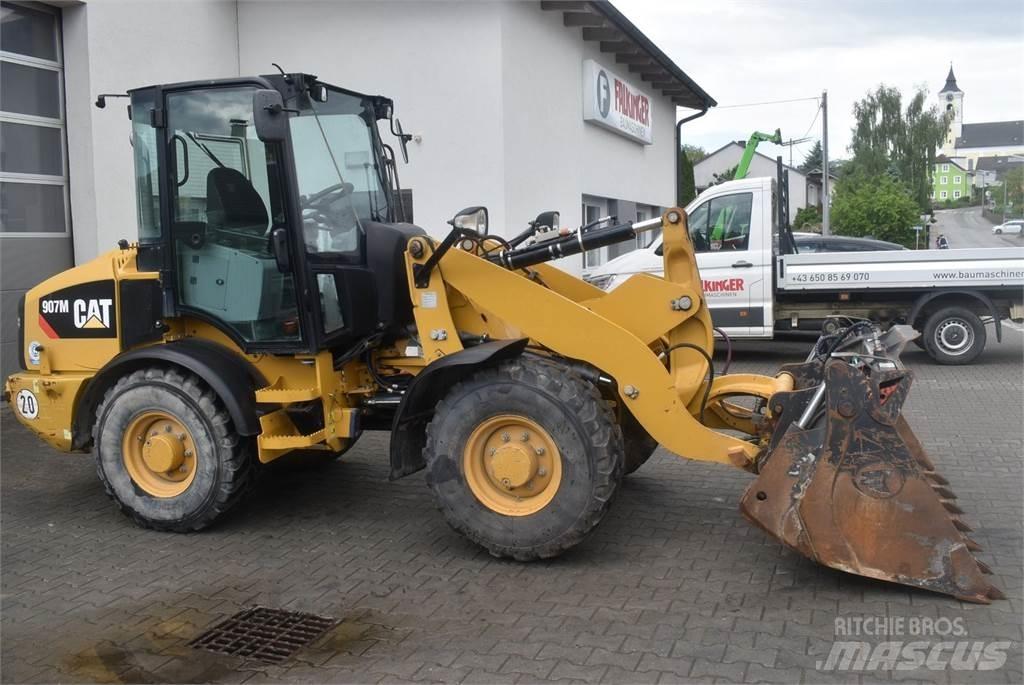 CAT 907M Фронтальні навантажувачі