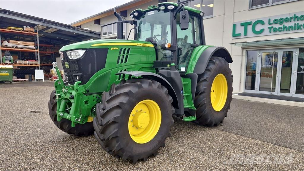 John Deere 6195M Трактори