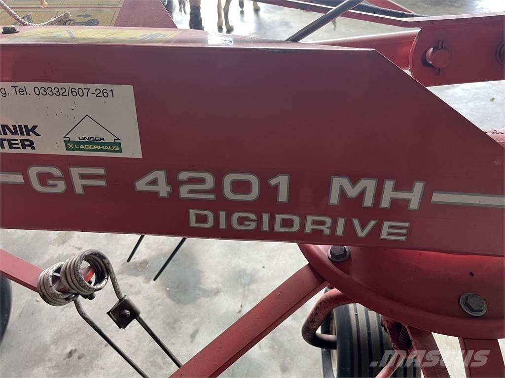 Kuhn GF 4201 MH Граблі і сінозворушувачі