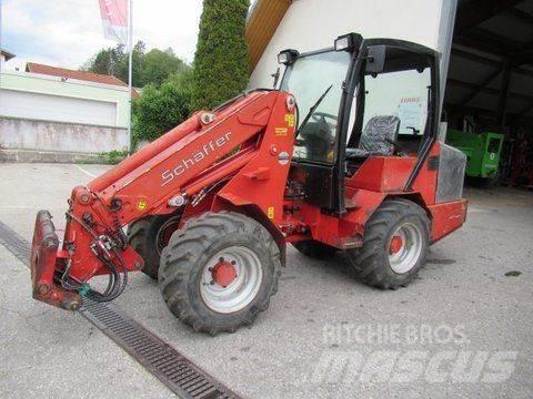 Schäffer 450T Фронтальні навантажувачі та екскаватори