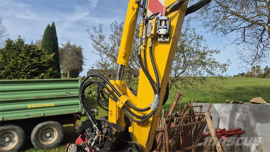 Takeuchi TB 295 W Колісні екскаватори