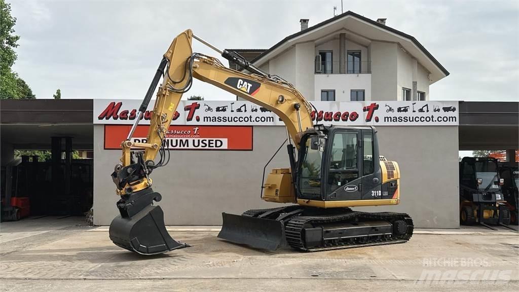 CAT 311D Середні екскаватори 7т. - 12т.