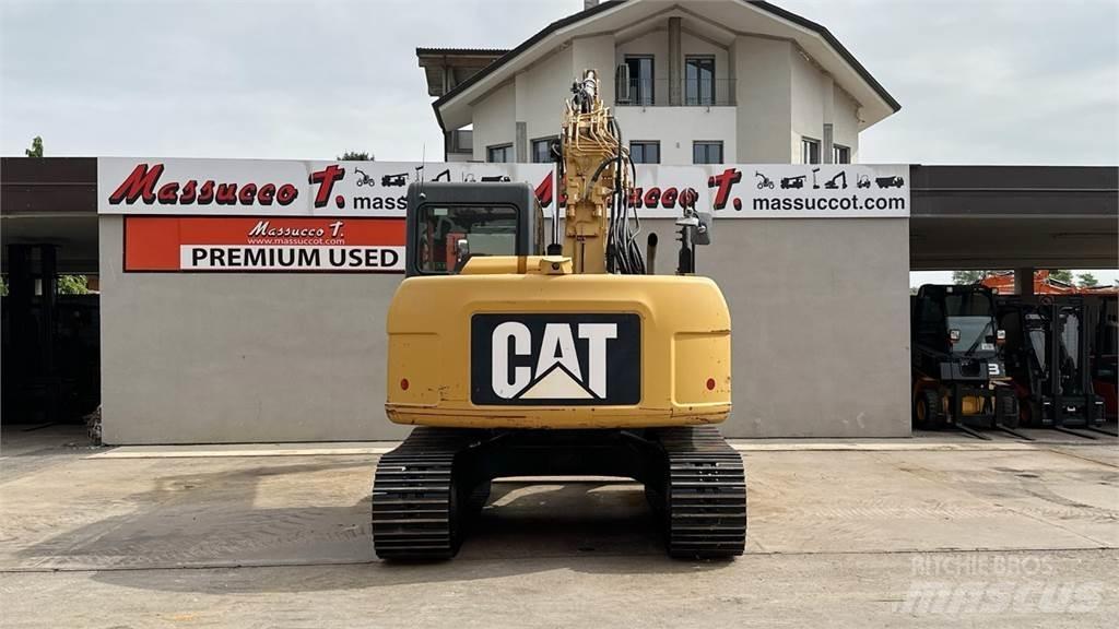 CAT 311D Середні екскаватори 7т. - 12т.
