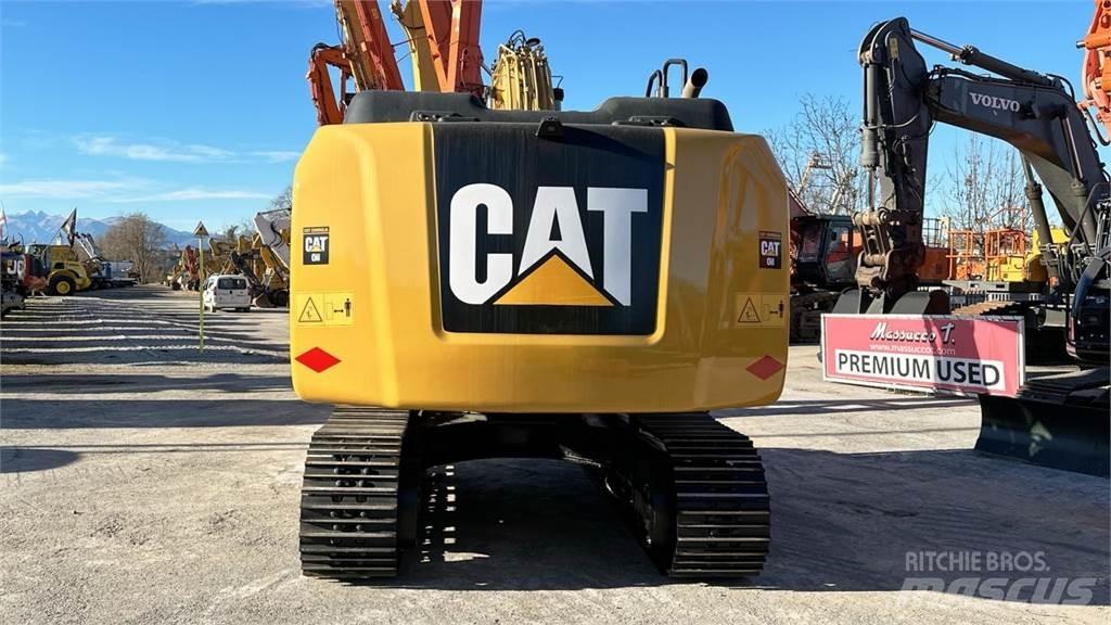 CAT 323E Гусеничні екскаватори