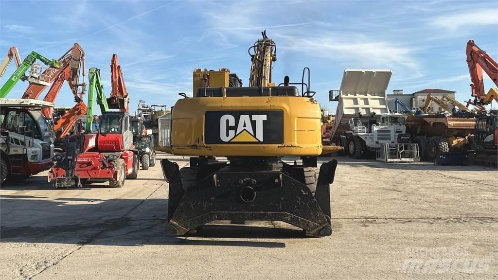 CAT M325D 4X4 Колісні екскаватори