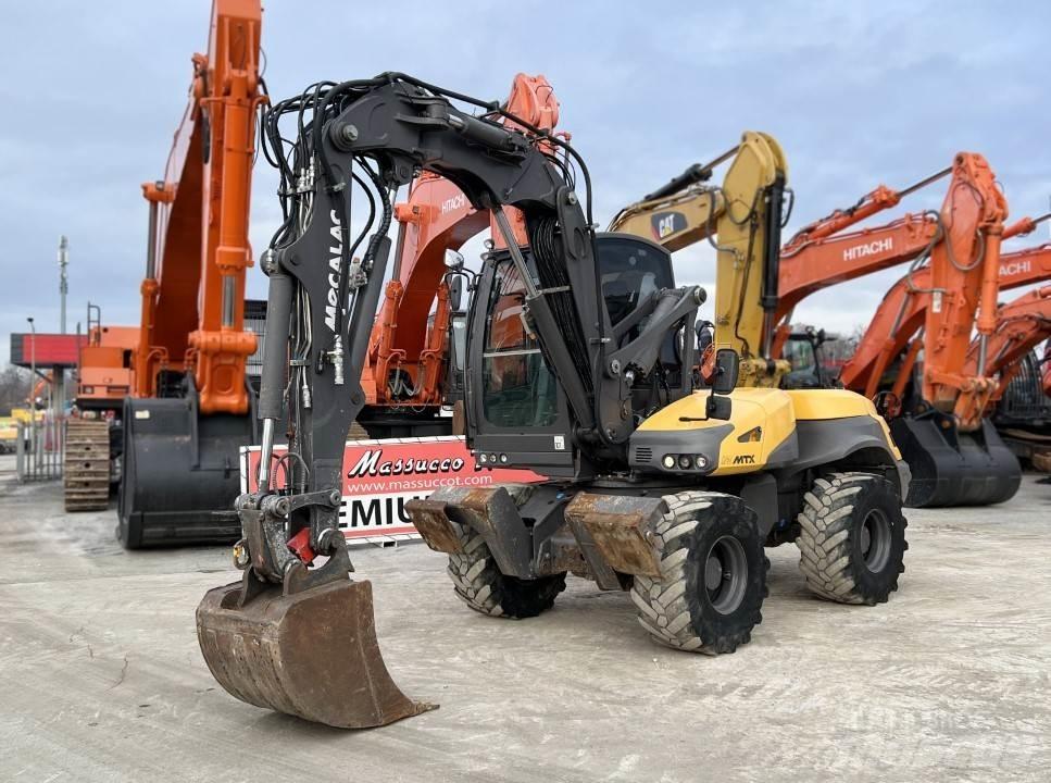 Mecalac 12 MTX Колісні екскаватори