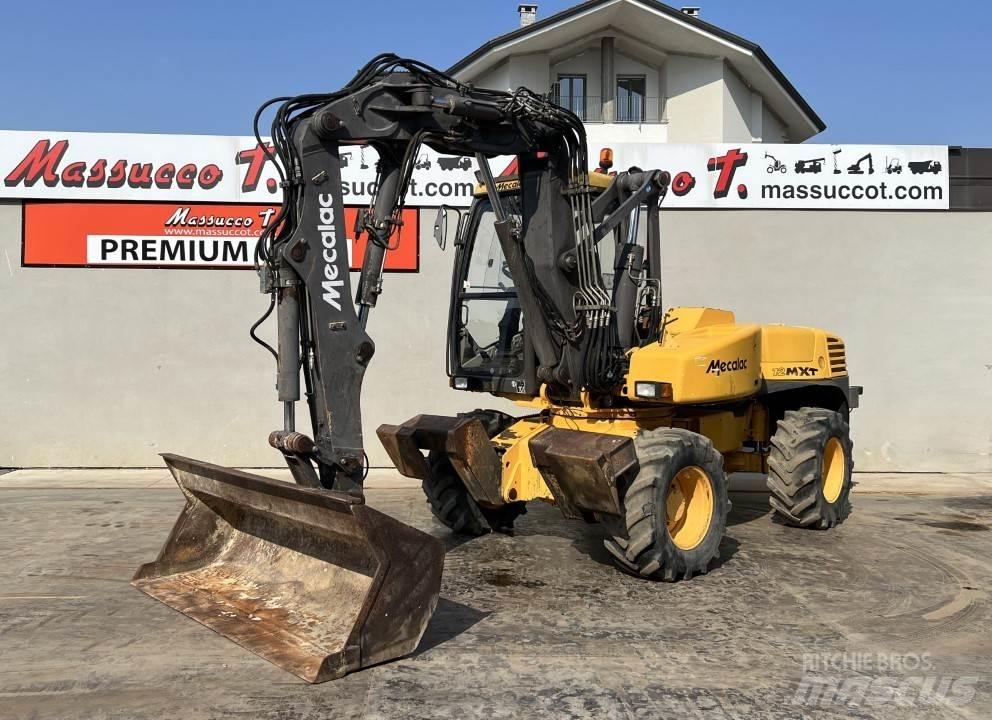 Mecalac 12MXT-E Колісні екскаватори