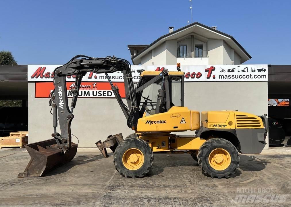 Mecalac 12MXT-E Колісні екскаватори