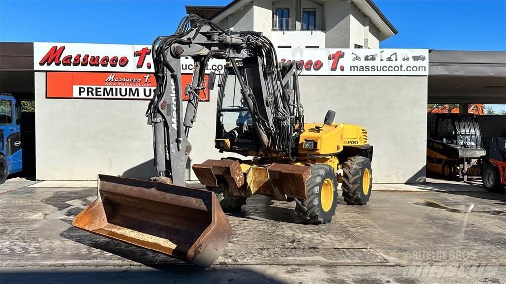 Mecalac 12MXT - E Колісні екскаватори