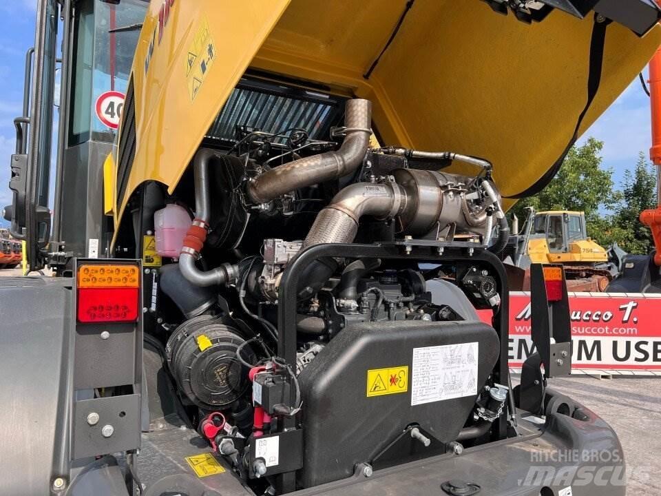 New Holland W110D Фронтальні навантажувачі