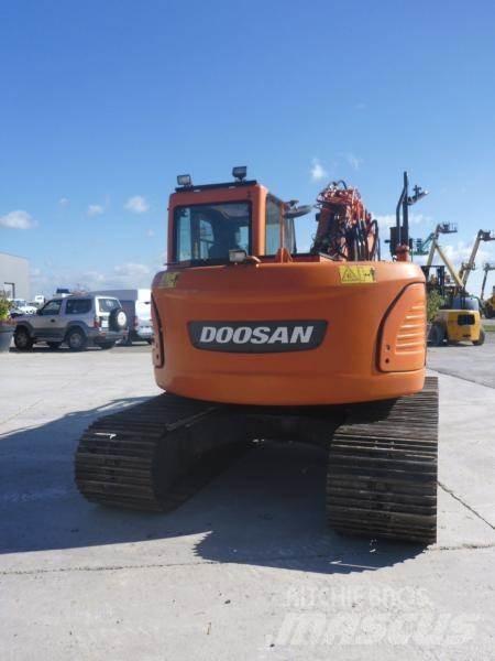 Doosan DX140LC Гусеничні екскаватори
