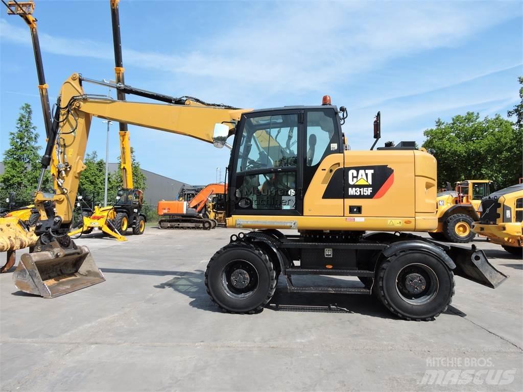CAT M315 Колісні екскаватори