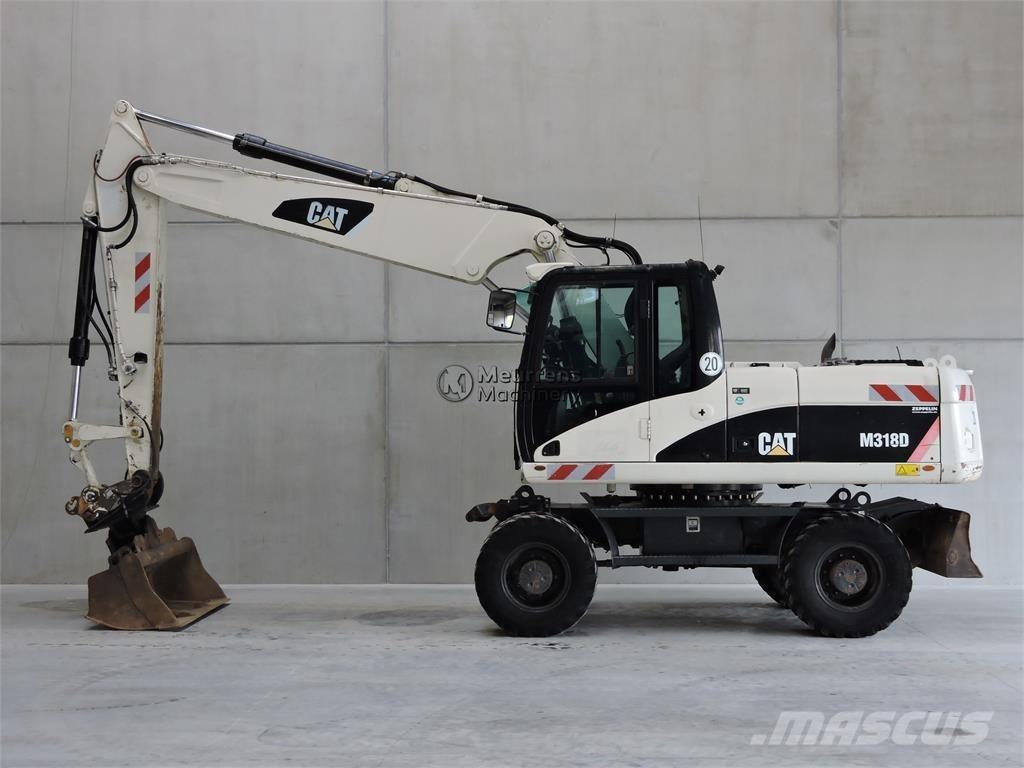 CAT M318D Колісні екскаватори