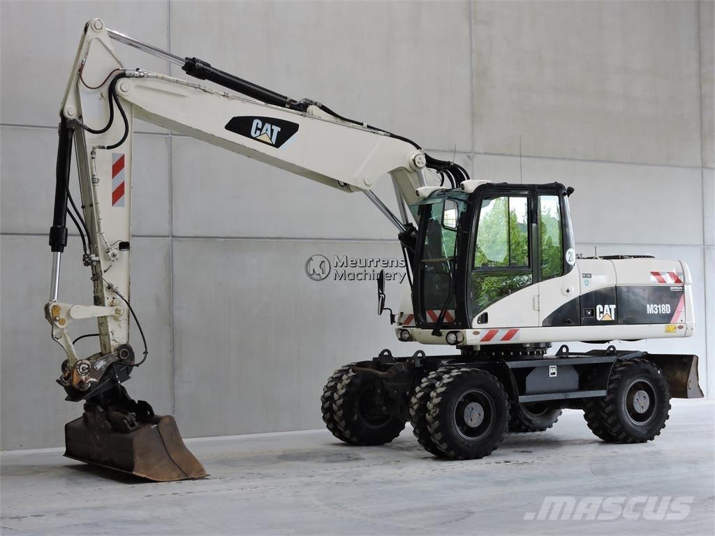 CAT M318D Колісні екскаватори