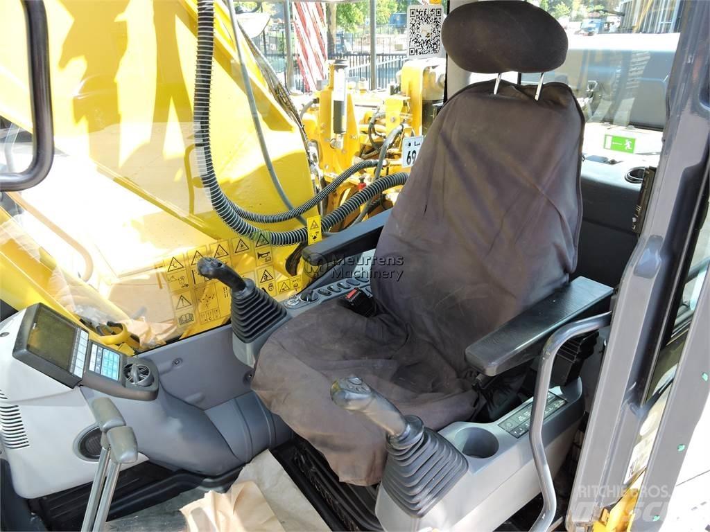 Komatsu PC210LC-10 Гусеничні екскаватори