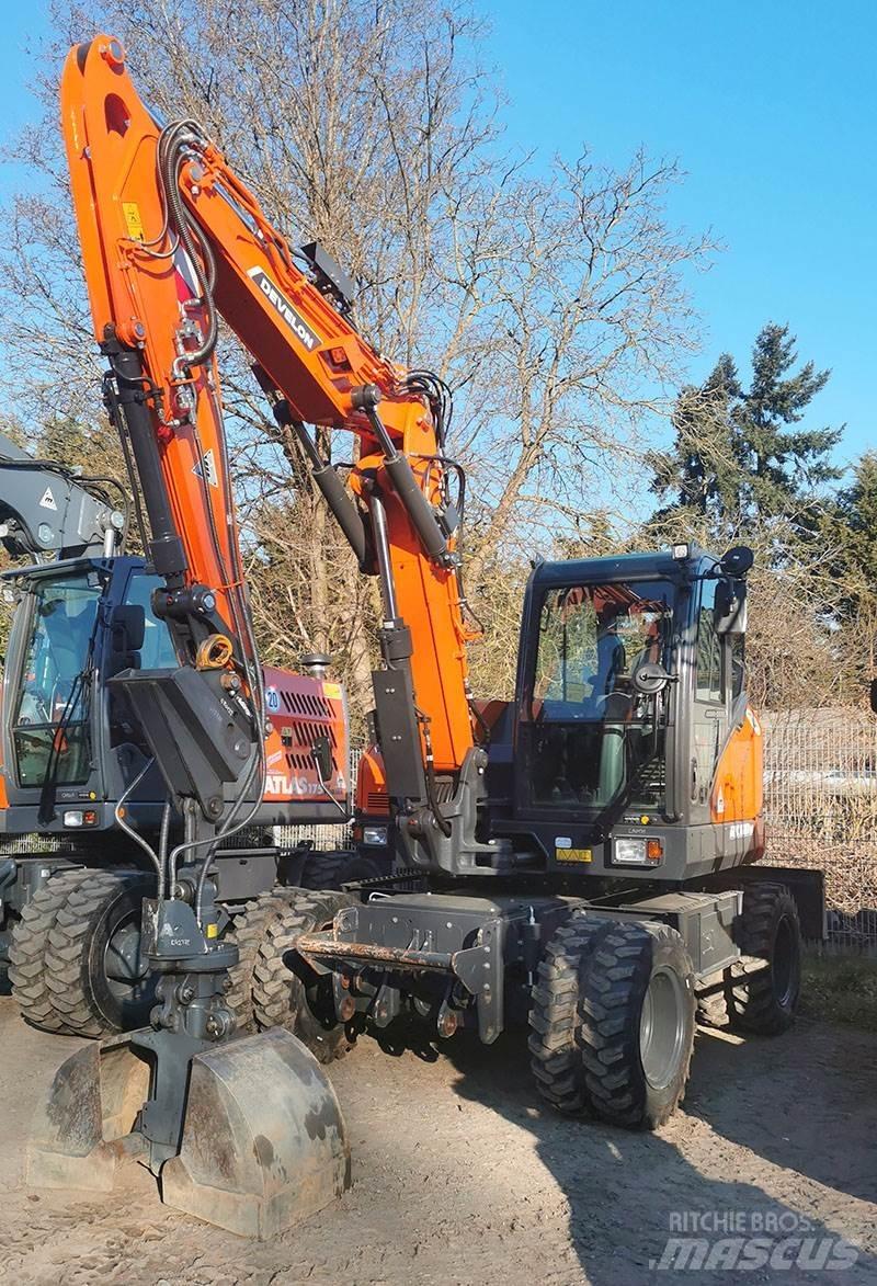Develon DX 100 W-7 Колісні екскаватори