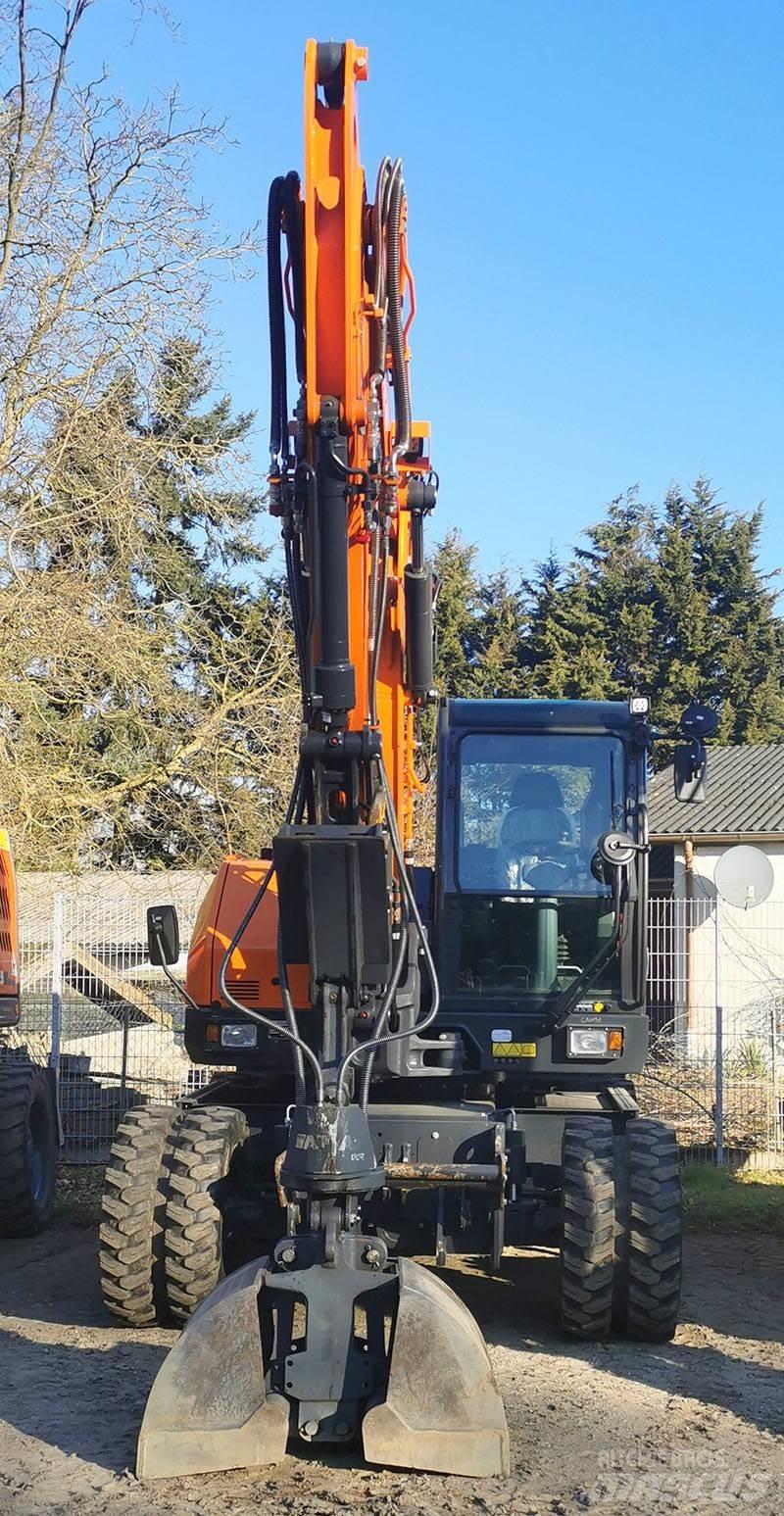 Develon DX 100 W-7 Колісні екскаватори