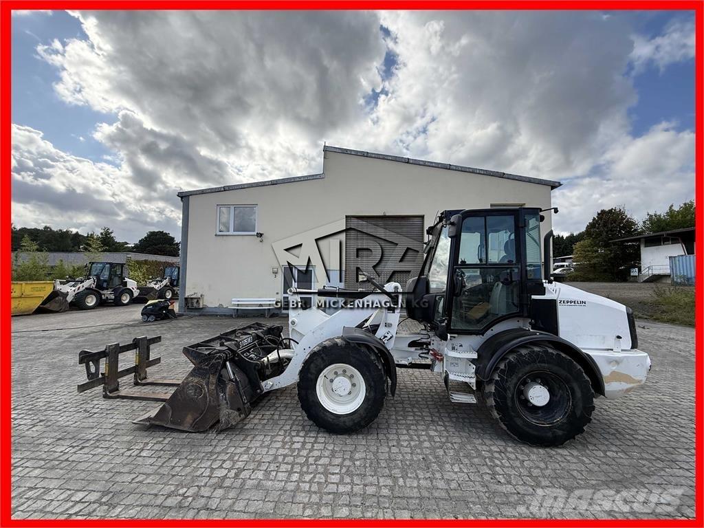 CAT 908M Фронтальні навантажувачі