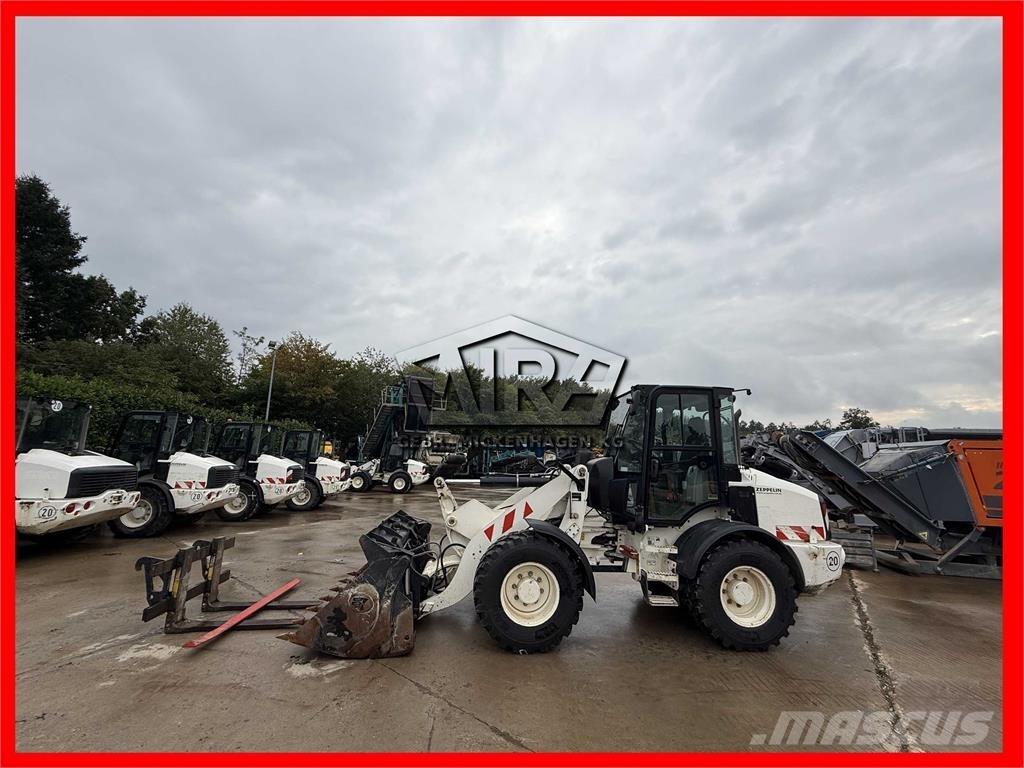 CAT 908M Фронтальні навантажувачі