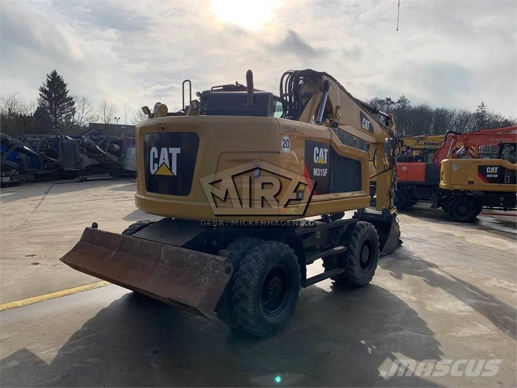 CAT M 315 F Колісні екскаватори