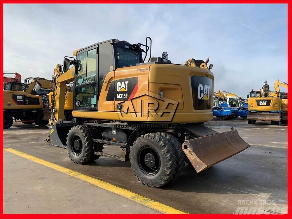 CAT M315 F Колісні екскаватори