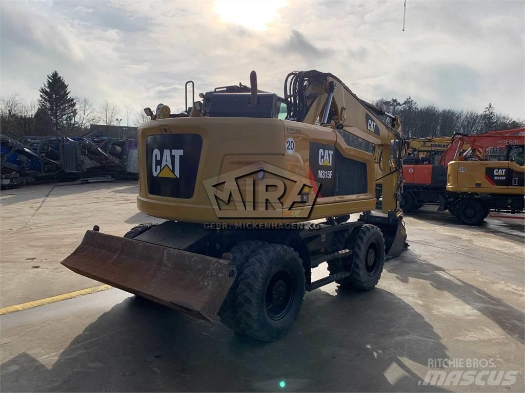 CAT M315 F Колісні екскаватори