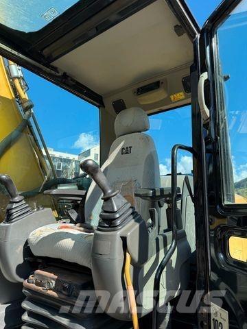 CAT 323D Гусеничні екскаватори