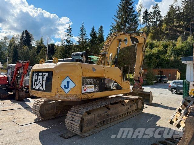 CAT 323D Гусеничні екскаватори