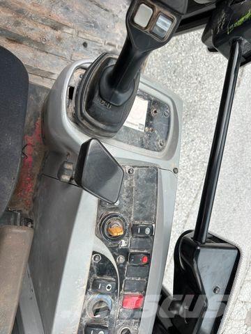 CAT 906H Колісні екскаватори