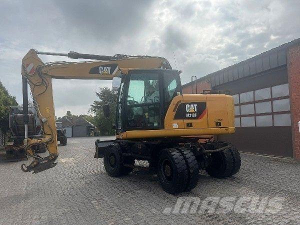 CAT M318F Колісні екскаватори