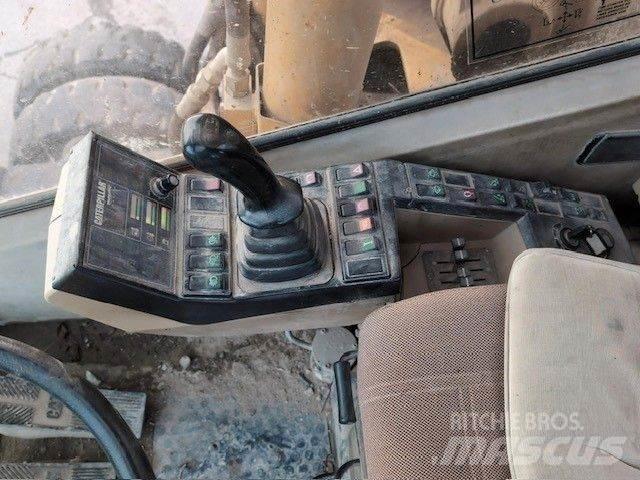 CAT M320 Колісні екскаватори