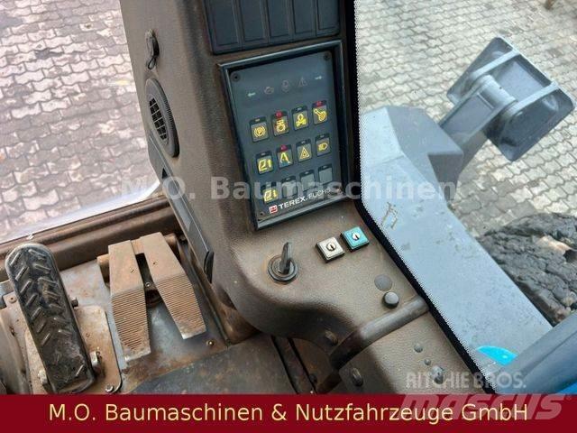 Fuchs MHL 350 Колісні екскаватори