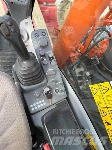 Hitachi ZX 210 LC Гусеничні екскаватори