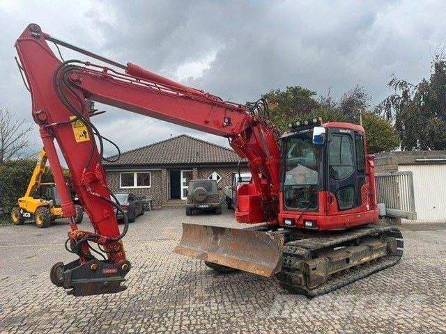 Komatsu 138US-11 Гусеничні екскаватори